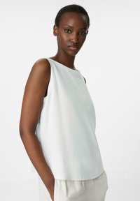 Блузка без рукавов Блузка без рукавов