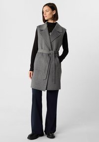 Длинный жилет Длинный жилет