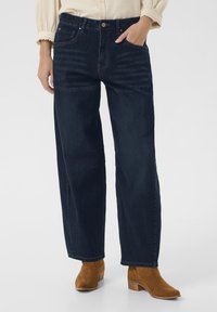 Свободные джинсы Свободные джинсы