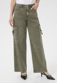 Клешеные джинсы Клешеные джинсы