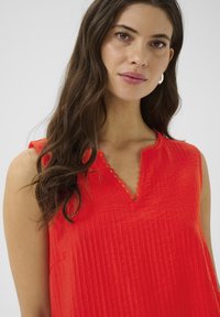 Длинный топ Длинный топ