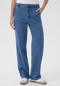 Свободные джинсы Свободные джинсы