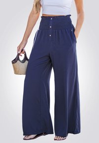 Широкие брюки Широкие брюки