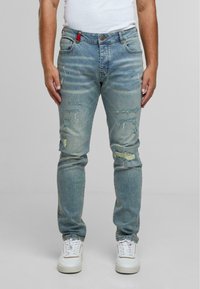 Узкие джинсы Узкие джинсы