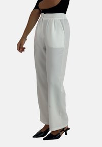 Широкие брюки Широкие брюки