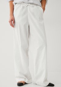 Широкие брюки Широкие брюки