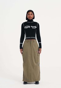 Юбка с накладными карманами Юбка с накладными карманами