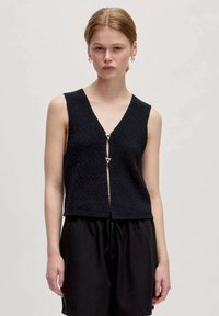 Жилет Жилет