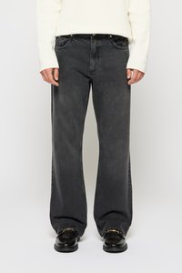 Клешеные джинсы Клешеные джинсы