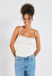 Топ на бретельках Топ на бретельках