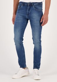 Узкие джинсы Узкие джинсы