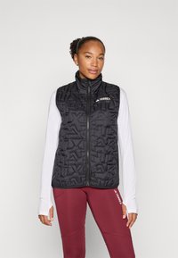 Спортивный жилет Спортивный жилет