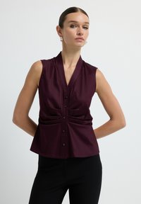 Блузка без рукавов Блузка без рукавов