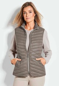 Стеганый жилет Стеганый жилет