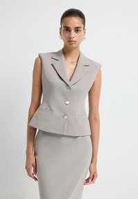 Жилет Жилет