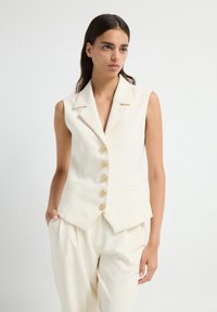 Жилет Жилет