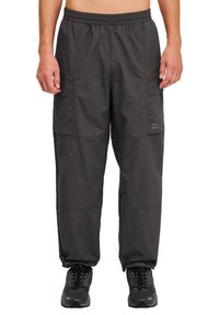 Брюки с накладными карманами Брюки с накладными карманами