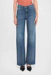 Джинсы Джинсы