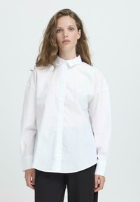 Длинная блузка Длинная блузка