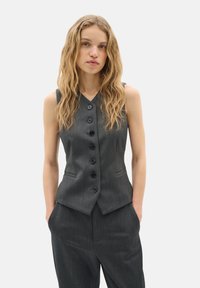 Жилет Жилет