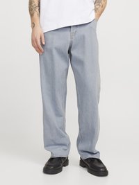 Свободные джинсы Свободные джинсы