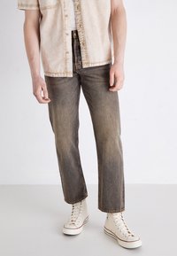 Свободные джинсы Свободные джинсы