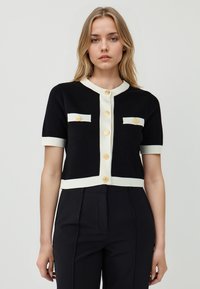 Жилет Жилет