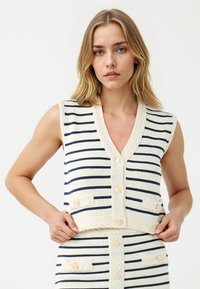 Жилет Жилет