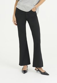 Клешеные брюки Клешеные брюки