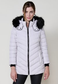 Длинная куртка Длинная куртка