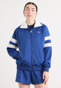 Спортивная куртка Спортивная куртка