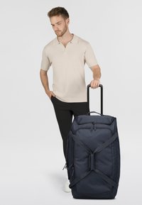 Чемодан на колесах Чемодан на колесах