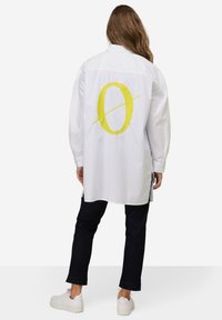 Длинная блузка Длинная блузка