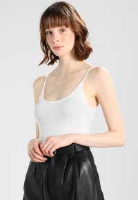 Длинный топ Длинный топ