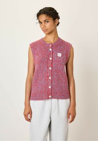 Вязаный жилет Вязаный жилет