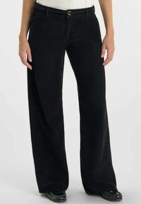 Свободные джинсы Свободные джинсы