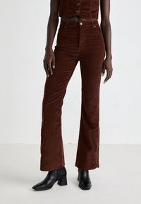 Клешеные брюки Клешеные брюки