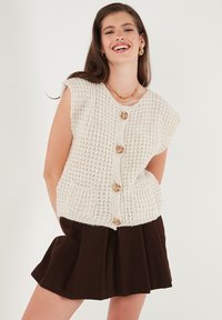 Жилет Жилет