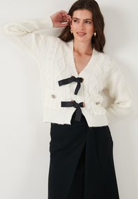 Жилет Жилет