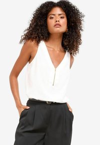 Жилет Жилет