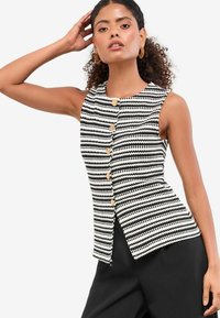 Жилет Жилет