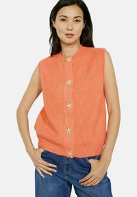 Вязаный жилет Вязаный жилет