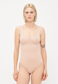 Корректирующее белье Корректирующее белье