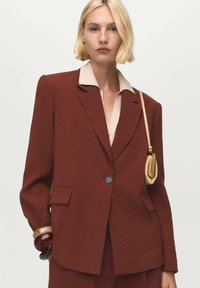 Блейзер Блейзер