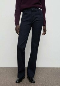 Клешеные брюки Клешеные брюки