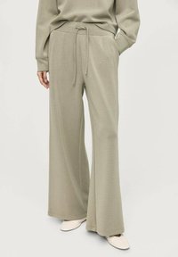 Широкие брюки Широкие брюки