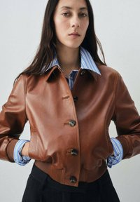 Кожаная куртка Кожаная куртка