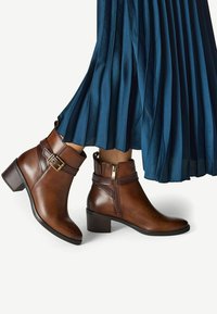 Ковбойские сапоги Ковбойские сапоги