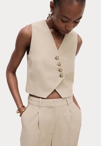 Жилет Жилет