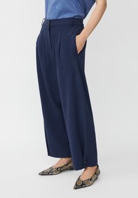 Широкие брюки Широкие брюки